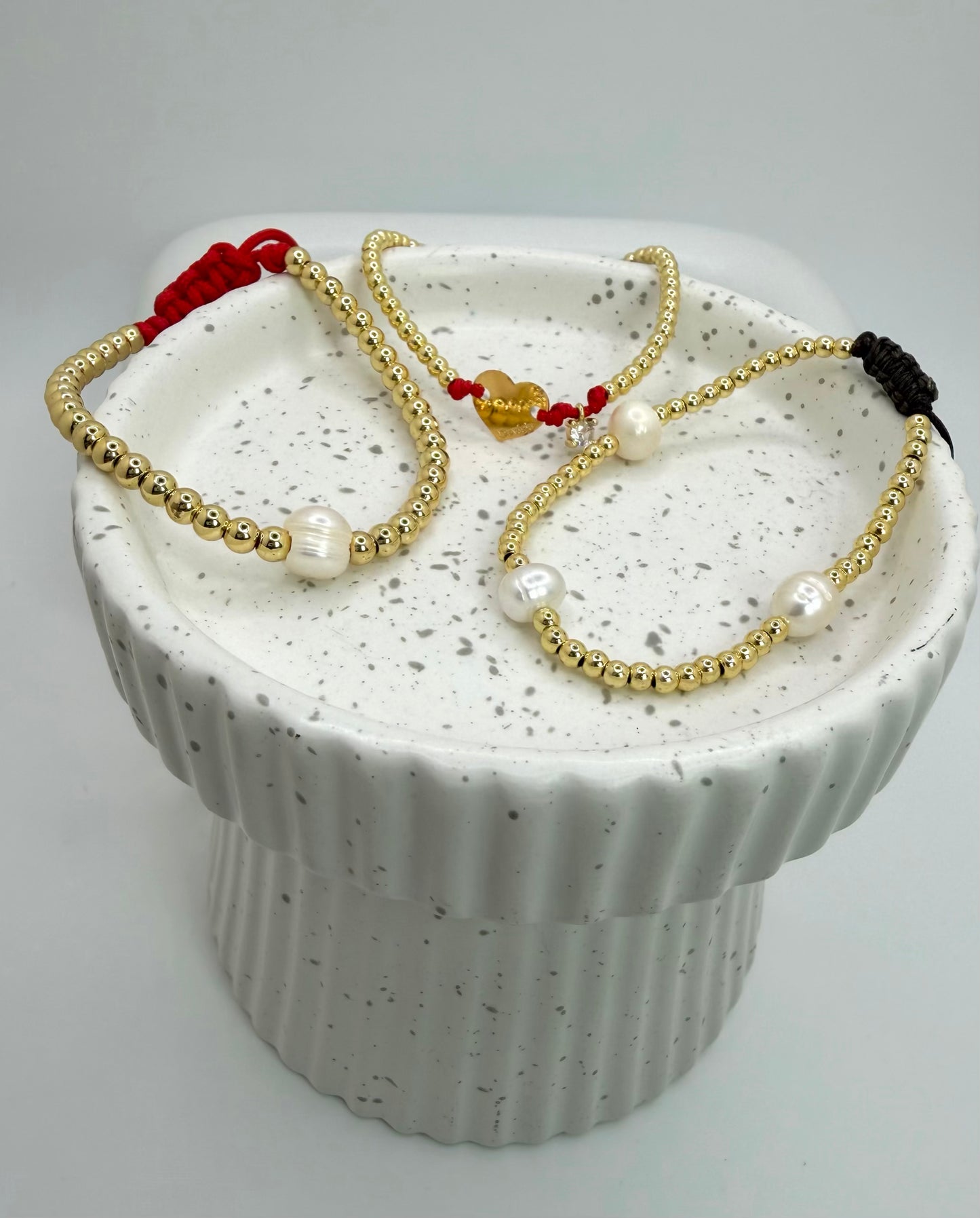 RED PEARLS SET BRACELETS